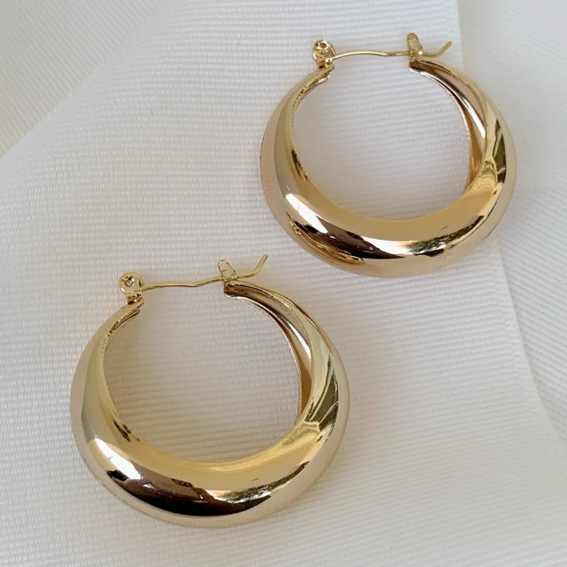 Aretes de oro blanco con zirconia cúbica